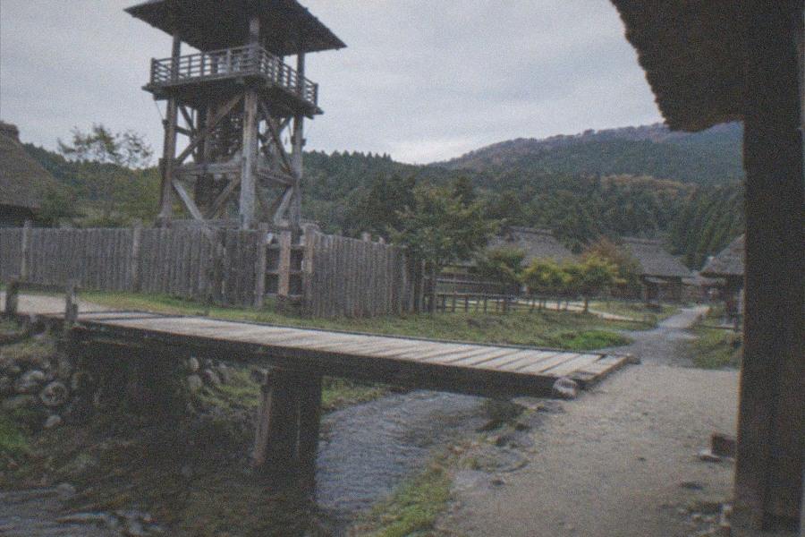 Costumed Edo-period townspeople walking the recreated main street at Edo Wonderland Nikko Edomura