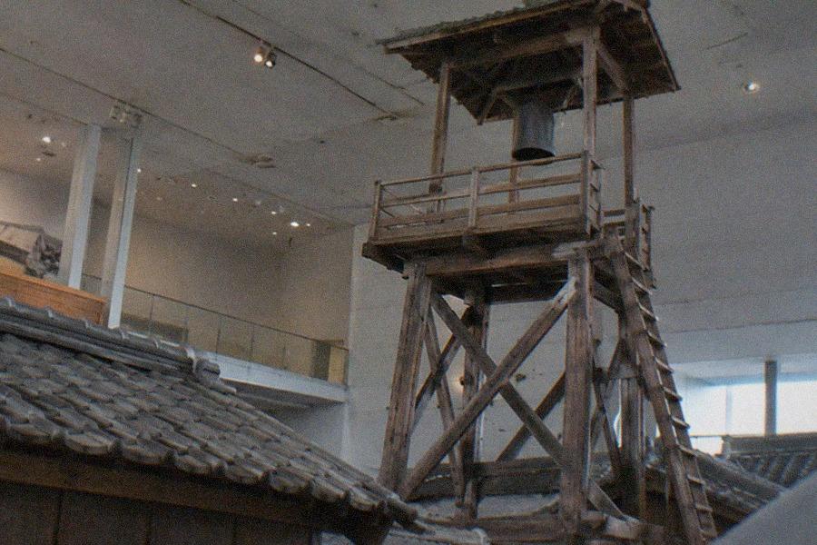Recreated Edo-period Fukagawa streetscape inside Fukagawa Edo Museum, with wooden buildings and lanterns