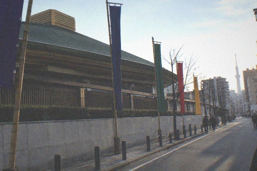 Clay sumo practice ring inside a wooden arena hall