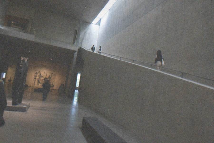 The front forecourt of The National Museum of Western Art with visitors arriving from Ueno Park